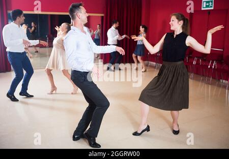 Couples enjoying active dance Stock Photo