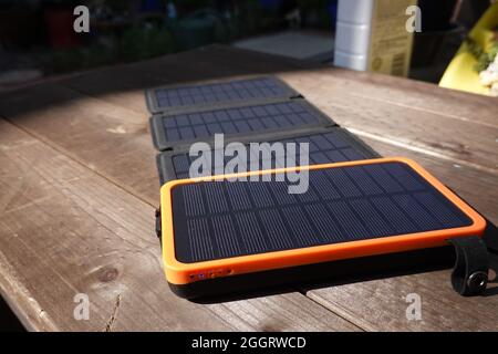 Portable solar panels with battery power bank storage Stock Photo