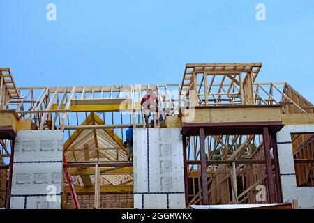 Ontario, Canada - September 2, 2021:  House under construction, with the main frame nearing completion. Stock Photo