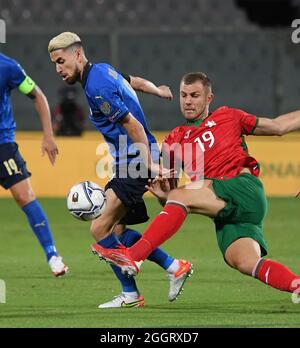 Florence, Italy. 2nd Sep, 2021. Italy's Jorginho (L) vies with Bulgaria's Atanas Iliev during the FIFA World Cup Qatar 2022 qualification Group C football match between Italy and Bulgaria in Florence, Italy, on Sept. 2, 2021. Credit: Alberto Lingria/Xinhua/Alamy Live News Stock Photo