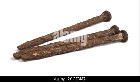 Old Rusty Chisels Lying on White Background Stock Photo
