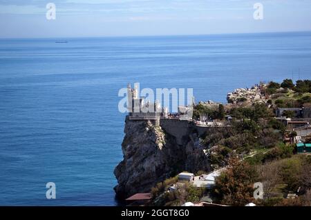 swallow's nest is an ancient castle on a rock, the symbol of the Republic of Crimea on the background of blue sea. Yalta Stock Photo