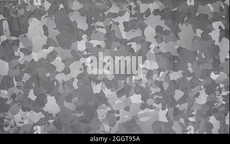 Close-up of scratched gray galvanized zinc plate. Abstract full frame textured background in black and white. Copy space. Stock Photo