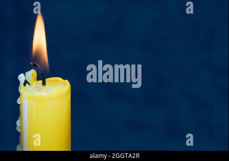 Candle with smoke and flame as a background with structure and copy space Photographed in the studio Stock Photo