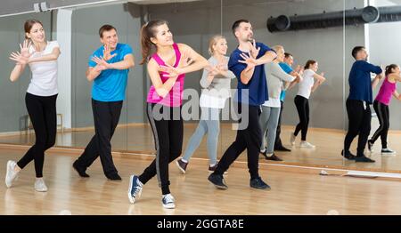 People practicing vigorous dance Stock Photo