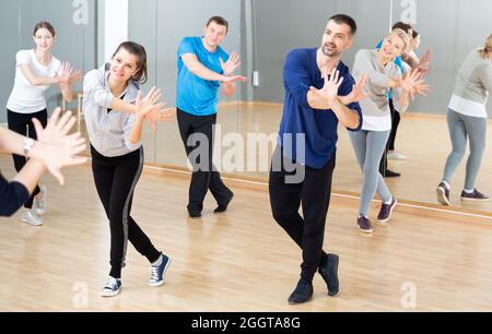 People practicing vigorous dance Stock Photo