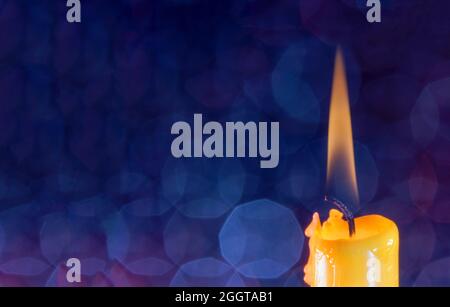 Candle with smoke and flame as a background with structure and copy space Photographed in the studio Stock Photo