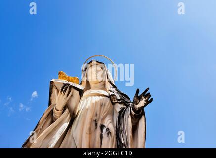 Montecassino Abbey -Italy - August 29 -2021-statue of St. Scolastica against blue sky  , Benedictine monastery Stock Photo