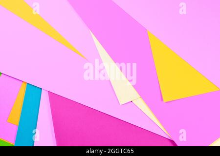 Sheet of multicolored paper background , yellow , pink , blue and purple Stock Photo