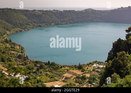 Nemi, Italy - august 16 2021 - Lake Nemi is a beautiful turquoise volcanic lake about 30 kilometers from Rome. Caligula's ships were found on the bott Stock Photo