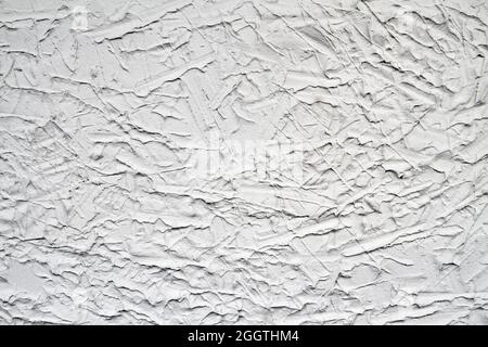 Decorative gray plaster effect on wall. Plaster texture Stock Photo
