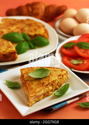 Croissannt omelette stuffed with cheese and ham. Stock Photo