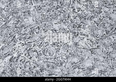 Gray grooved stucco on wall. Plaster patterned texture or background. Closeup Stock Photo