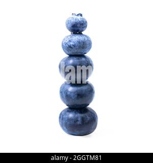 Pyramid made of fresh blueberries isolated on white background. Balanced diet concept. Stock Photo