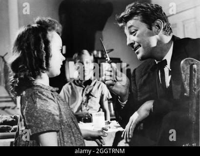 SALLY JANE BRUCE BILLY CHAPIN and ROBERT MITCHUM in THE NIGHT OF THE HUNTER 1955 director CHARLES LAUGHTON novel Davis Grubb screenplay James Agate cinematographer Staley Cortez music Walter Schumann art direction Hilyard M. Brown Paul Gregory Productions / United Artists Stock Photo