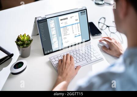 E Invoice On Laptop. Online Electronic Bill Management Stock Photo