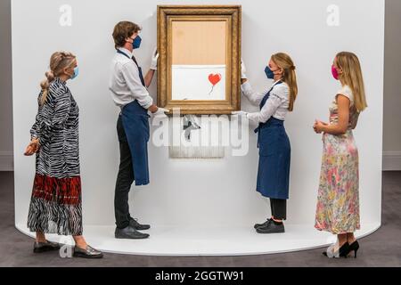 EMBARGOED till 12 noon 03 September 2021 - London, UK. 3rd Sep, 2021. Banksy's Love is in the bin, a painting shredded by the artist in Sotheby's london auction room in 2018. It is to be offered in the contemporary art evening auction on october 14 with an estimate of £4-6 million. It sold in 2018 for £1m. On show at Sotheby's New Bond Street Galleries, London. The sale takes place on 14 Oct. Credit: Guy Bell/Alamy Live News