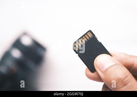 hand hold SD memory card, Stock Photo