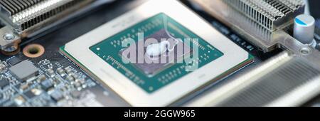 Thermal paste lying on microchip for video card closeup Stock Photo