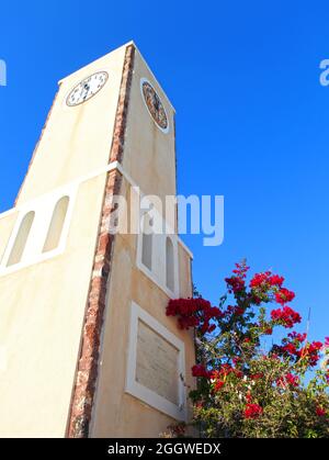 A tall clock tower inthe town of Oia in Santorini, Greece. Stock Photo