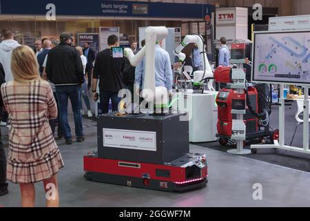 Poznan, Poland 06 Aug 2021: HIGH TECH EXPO. Fanuc robot CRX-10iA collaborative robots. Robot arm in technology process, automatic industrial robot. IT Stock Photo