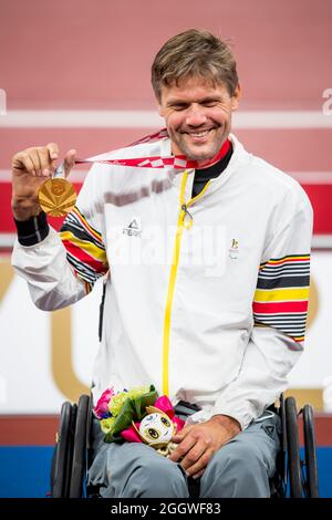 Paralympian athlete Peter Genyn , winner of the gold medal pictured on the podium of the final of the Men's 100m T51 athletics event on day ten of the Stock Photo