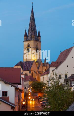 Sibiu streets with Cathedral in evening Stock Photo