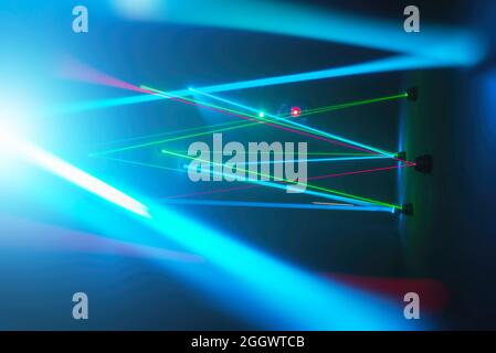 Laser beams in dark room, fun house concept Stock Photo