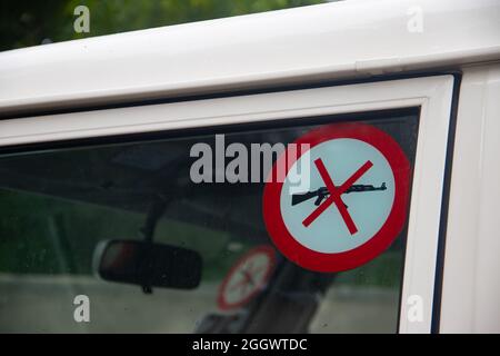 No guns policy and rules sticker on vehicle, humanitarian workers, impartiality and neutrality Stock Photo