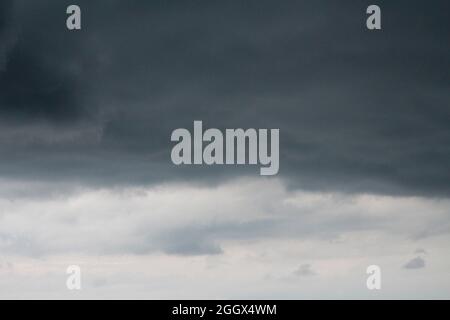 Dark sky and dramatic black cloud before rain comming. Stock Photo