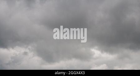 Dark sky and dramatic black cloud before rain comming. Stock Photo