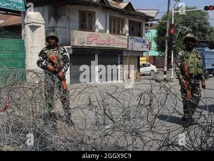 Srinagar, India. 03rd Sep, 2021. Indian paramilitary soldiers stand guard in a closed market area in Delhi Srinagar, Kashmir, on September 3, 2021. Indian authorities enforced a security clampdown and a near-total communications blackout for a second straight day in Kashmir on Friday after the death of top separatists leader Syed Ali Shah Geelani who became the emblem of the regions defiance against New Delhi. (Photo by Sajad Hameed/INA Photo Agency/Sipa USA) Credit: Sipa USA/Alamy Live News Stock Photo