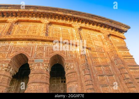 Famous terracotta (fired clay of a brownish-red colour, used as ornamental building material) arches at Radhashyam Temple, Bishnupur, West Bengal, Ind Stock Photo