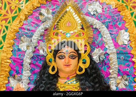 Purulia, West Bengal, India - August 15th 2017 : Colorful Chhau (or chhou) masks of Goddess Durga, handicrafts on display for sale.Chhou, tribal dance Stock Photo