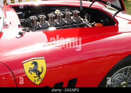 Hampton Court, Surrey, UK. 3rd Sep, 2021. Scenes from the famous Hampton Court Concourse of Elegance, staged in the gardens of the Royal Palace next to the River Thames 0 Ferrari engine and badge. Credit: Motofoto/Alamy Live News Stock Photo