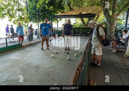 Trevignano Romano, Italy: Trevignano Romano, Italy: Italian men playing bocce and scoring in a match Stock Photo