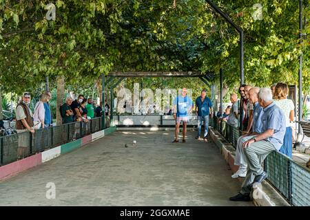 Trevignano Romano, Italy: Trevignano Romano, Italy: Italian men playing bocce and scoring in a match Stock Photo