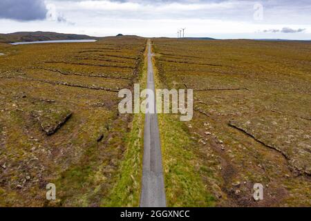 Aerial view form drone of the bleak and desolate Pentland Road crossing moorland on on Isle of Lewis, Outer Hebrides, Scotland, UK Stock Photo