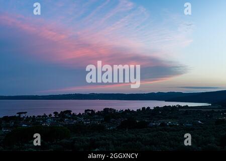 Bracciano, Italy. 03rd Sep, 2021.  A colourful  pink cloud formations develop over lake Bracciano during sunset. Credit: amer ghazzal/Alamy Live News Credit: amer ghazzal/Alamy Live News Stock Photo