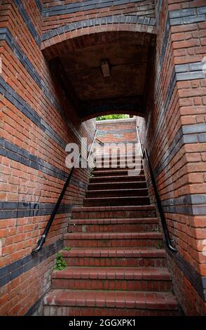 A old Victorian set of red brick steps near a canal in Birmingham, UK Stock Photo