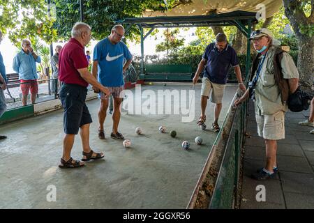 Bracciano, Italy. 03rd Sep, 2021. Italian men  enjoy playing Bocce on a hot summer day under a shaded area. Bocce is a ball sport which is similar to  British bowls and French pétanque and is played around Europe and by Italian immigrants in Australia and North America.  Credit: amer ghazzal/Alamy Live News Credit: amer ghazzal/Alamy Live News Stock Photo