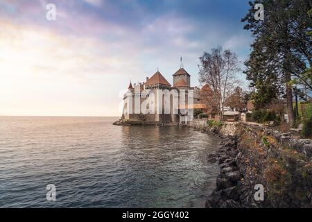 Chillon Castle and Lake Geneva at sunset - Canton of Vaud, Switzerland Stock Photo