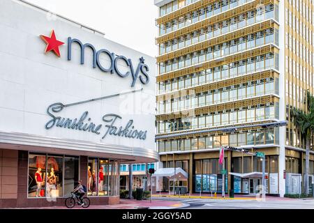 Miami Beach, USA - January 21, 2021: Sign for Macy's sunshine fashions department store at Meridian avenue in South Beach, Florida with people by exte Stock Photo