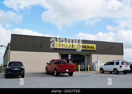 Houston, Texas USA 08-14-2019: Dollar General variety store exterior and parking lot in Humble, TX. Stock Photo