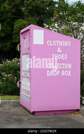Pink donation collection box in the Houston, Texas suburbs. Stock Photo