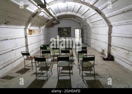 conference room in the cold war tunnel built in Communist  Enver Hoxha president era under the hill in the town of Gjirokaster in Albania Stock Photo