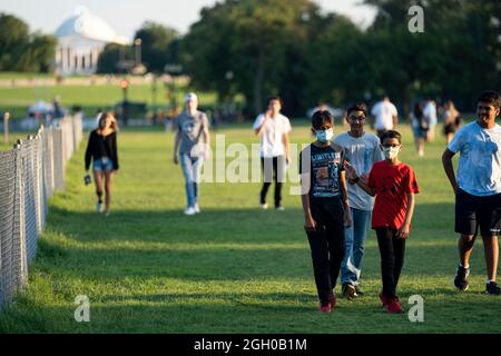 Washington DC, USA. 3rd Sep, 2021. Tourists visit the National Mall in Washington, DC, the United States, Sept. 3, 2021. U.S. employers added fewer-than-expected 235,000 jobs in August, indicating a marked slowdown in job growth amid a Delta variant-fueled COVID-19 surge, the U.S. Labor Department reported Friday. The latest figure was less than a quarter of the upwardly revised job gain of 1.1 million in July, and followed a revised job gain of 962,000 in June. Credit: Liu Jie/Xinhua/Alamy Live News Stock Photo