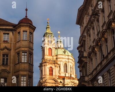 Baroque Dome and Spire of Saint Nicholas Church in the Lesser Town of Prague, Czech Republic in the Morning Stock Photo