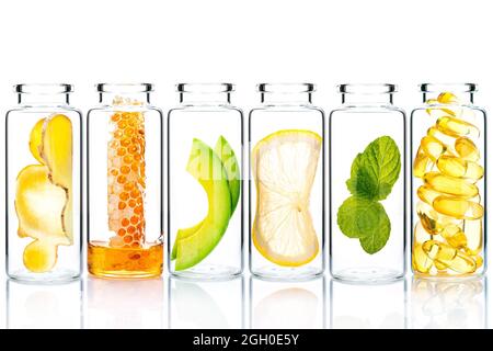 Alternative skin care and homemade scrubs with natural ingredients  in glass bottles isolate on white background. Stock Photo