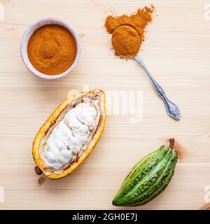 Ripe Indonesia's cocoa  setup on rustic wooden background. Stock Photo